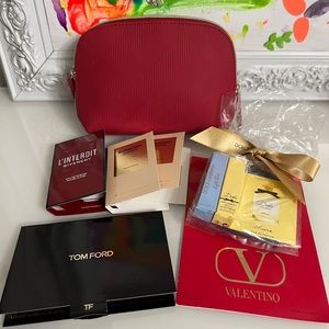 Burberry Authentic red makeup bag + 7 samples.